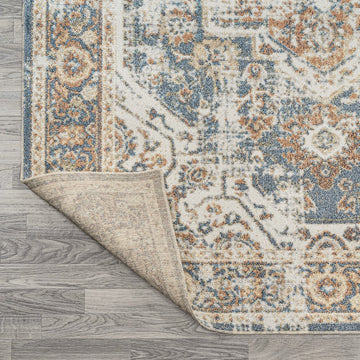 Keesha Bold Distressed Medallion Low-Pile Machine-Washable Area Rug